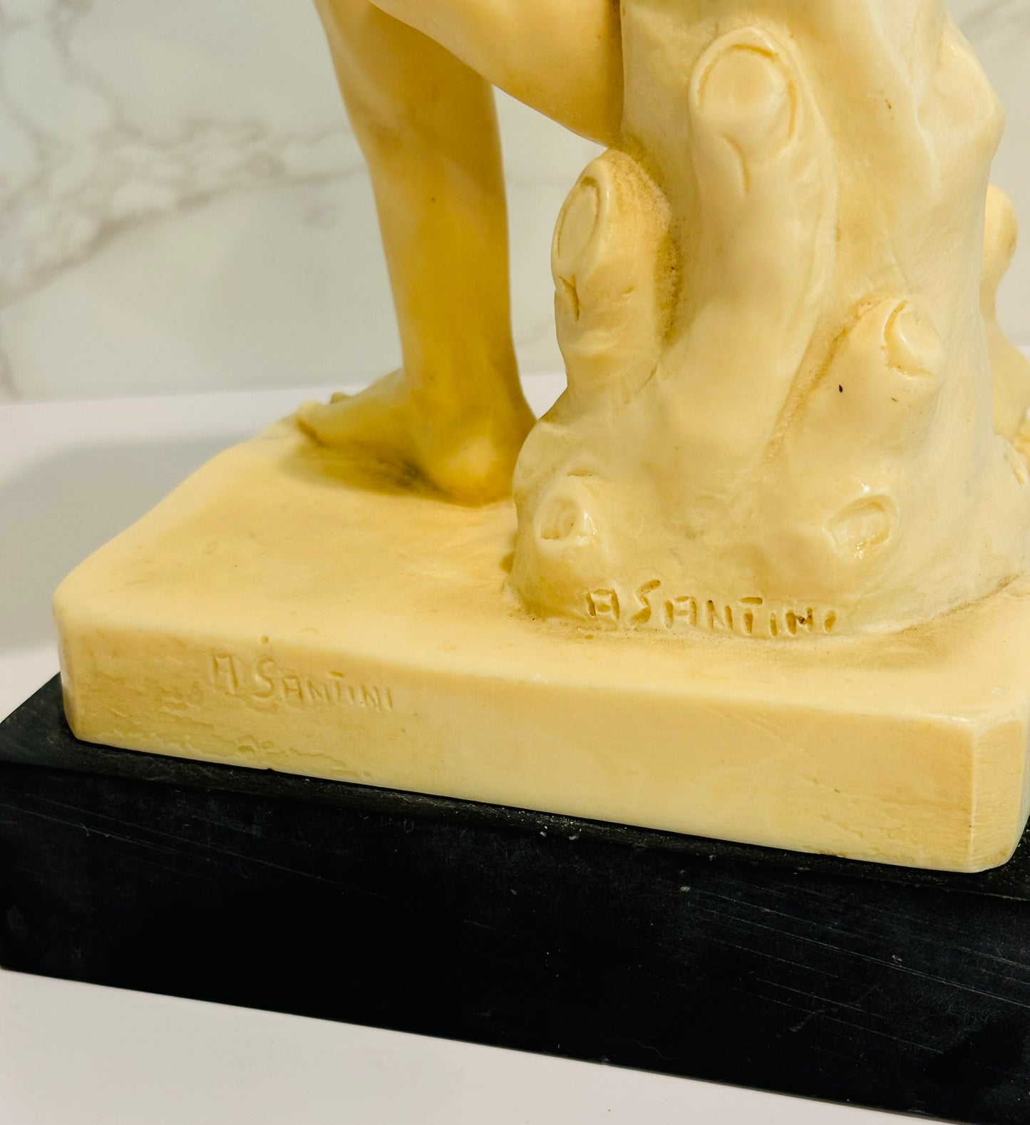 A. Santini Disc Thrower statue 12 h x 5 l x 3.5 w
