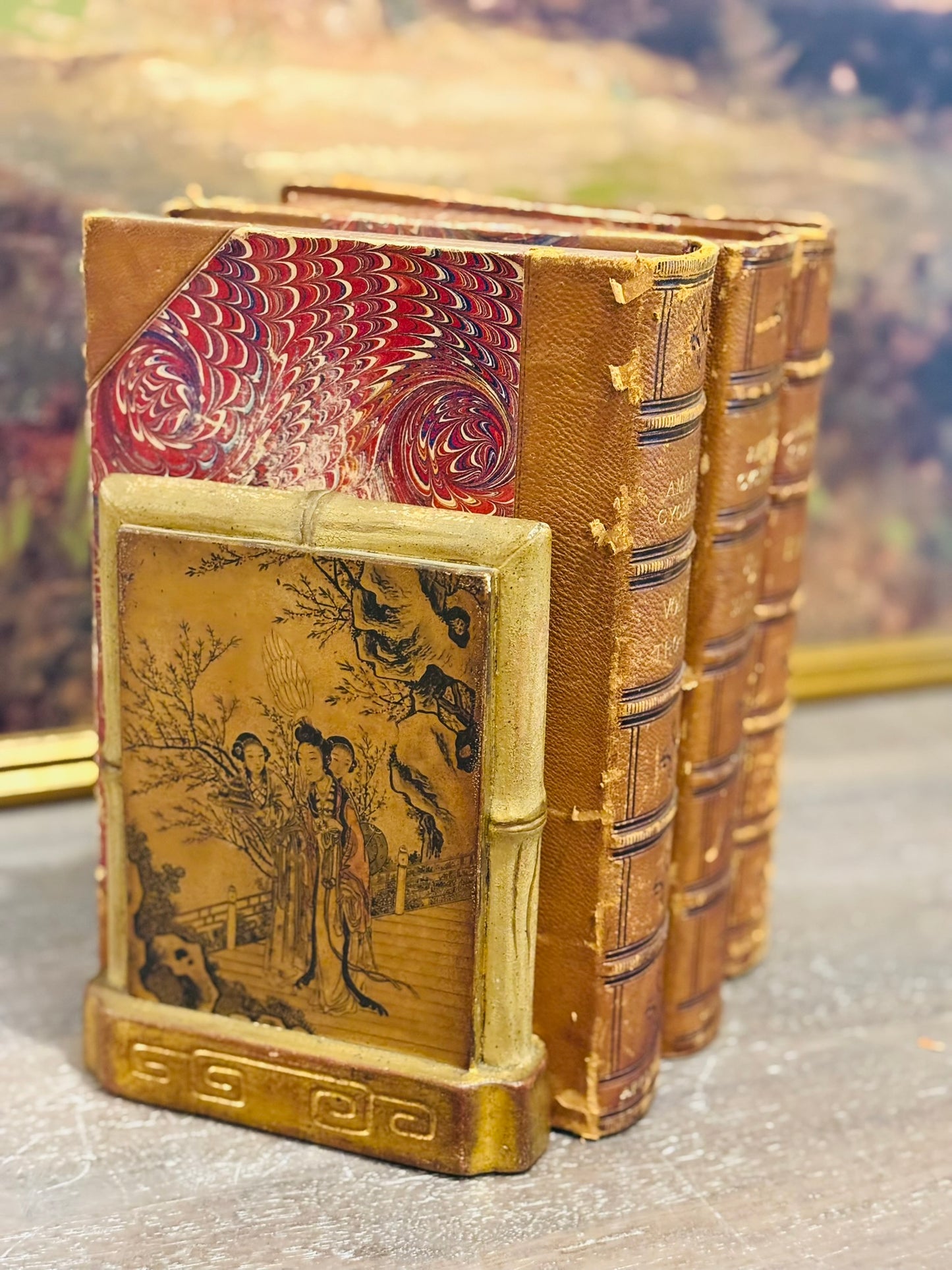 Pair of chinoiserie resin bookends with faux bamboo detail 7.75 h 5.5 w 4 d each