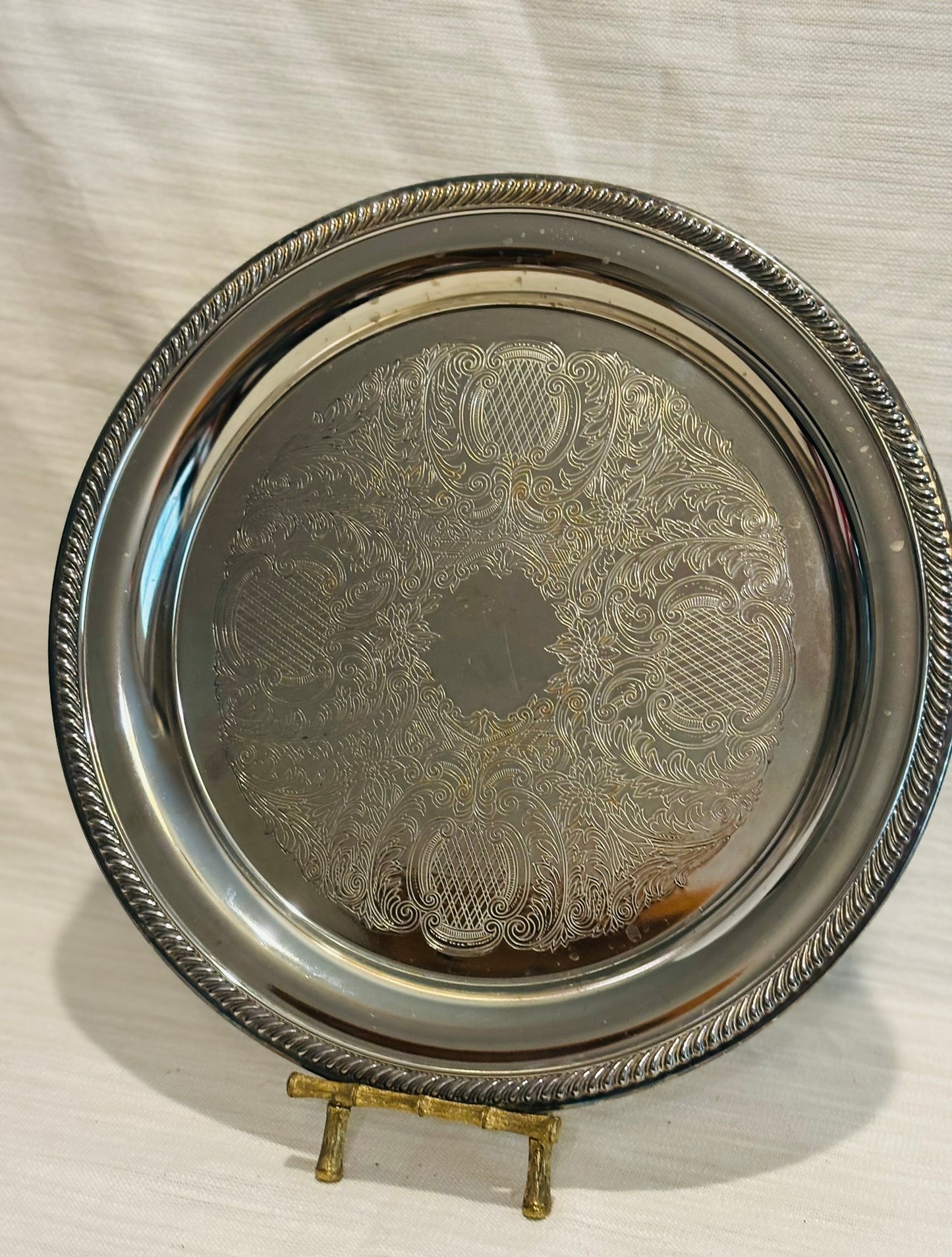 Round silverplate tray 12 w .75 h no marking