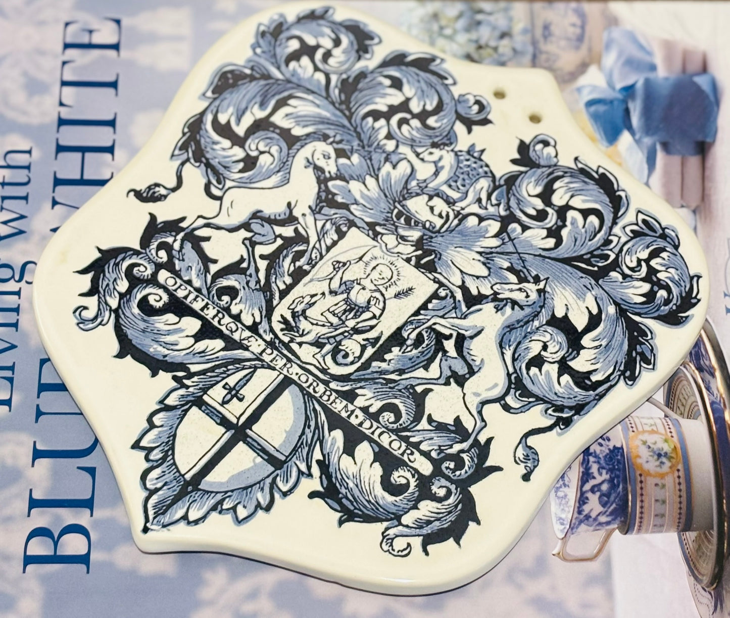 Blue and White Crest Tile 8.25 w 9.25 l .25 h