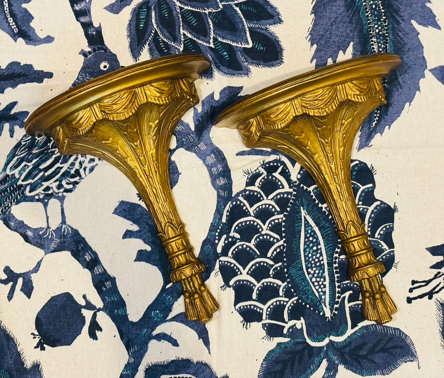 Pair of gold wall shelves with tassels 12 l 10 w 4 d