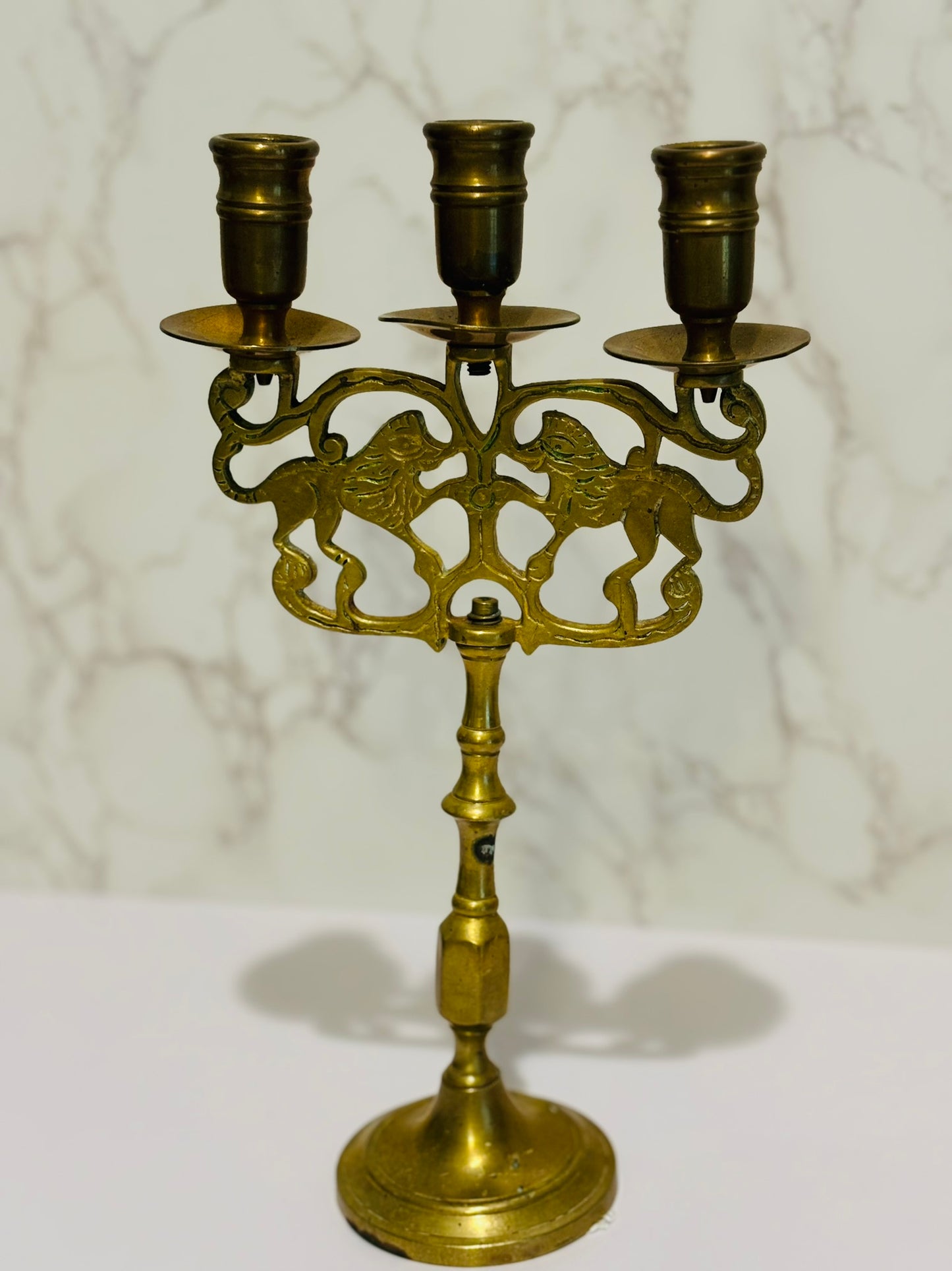 Antique brass lion candelabra 11 h x 6.5 w