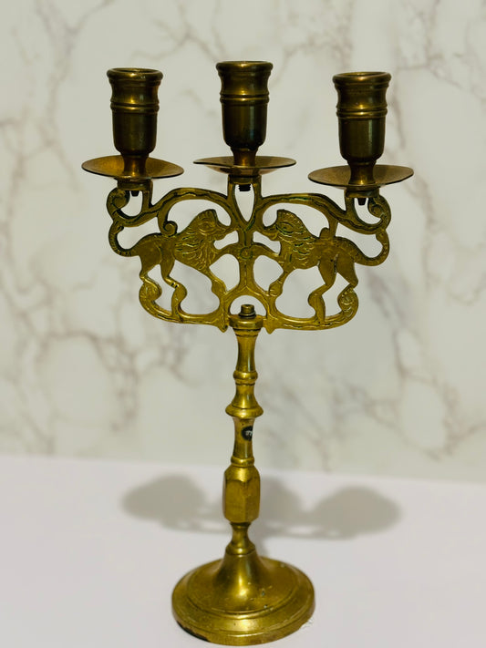 Antique brass lion candelabra 11 h x 6.5 w