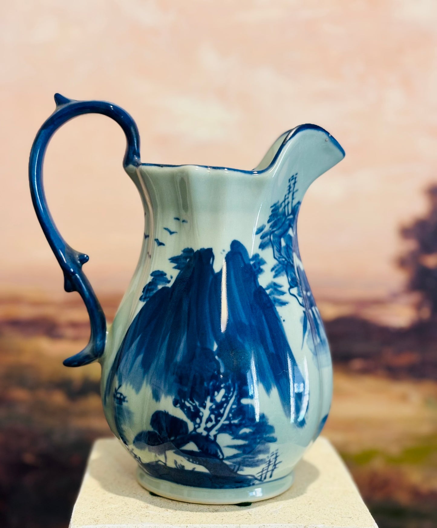 Blue and white asian pitcher flow blue style-no markings 9 h 7 d 5.5 w