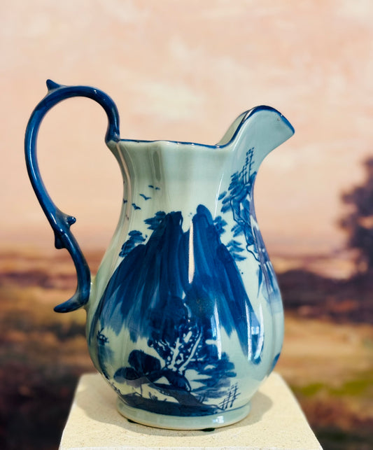 Blue and white asian pitcher flow blue style-no markings 9 h 7 d 5.5 w