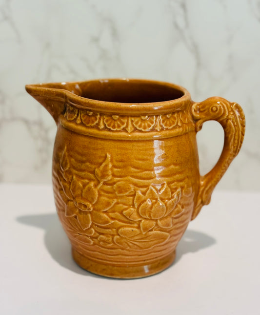 McCoy Ceramic Water lily pitcher (terracotta color) 7.25 h x 5 w