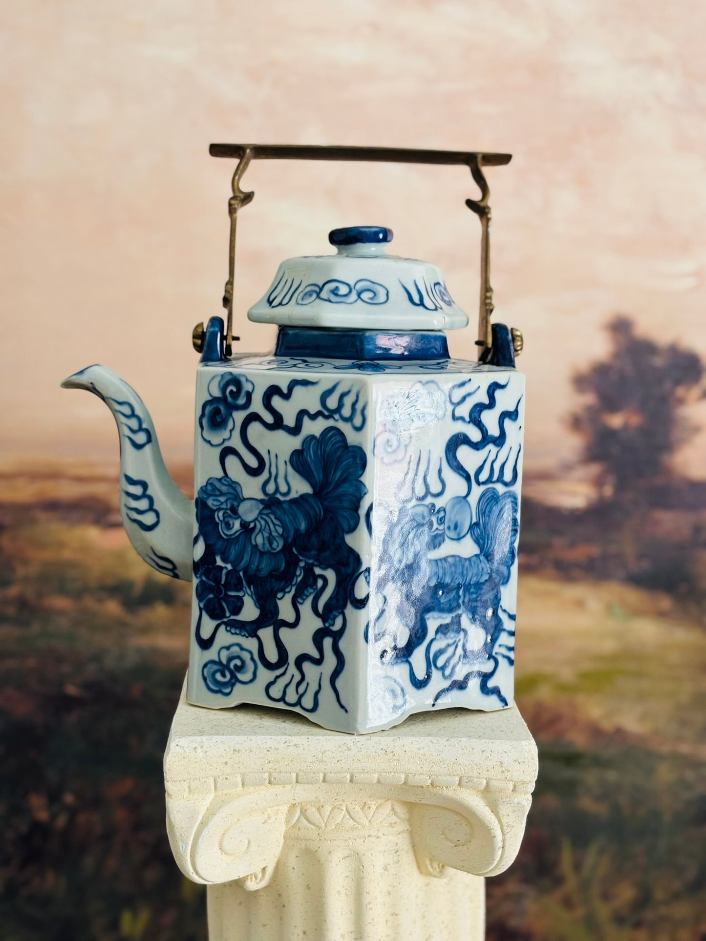 Blue and white buddhist lions teapot with brass handle  8.5 w 7 d 11 to top of handle