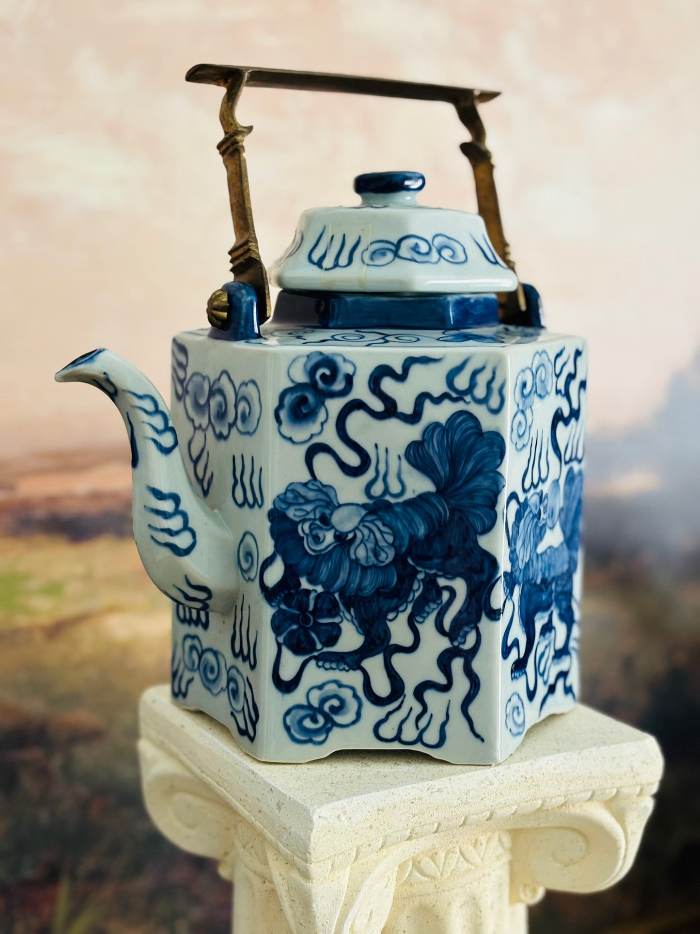 Blue and white buddhist lions teapot with brass handle  8.5 w 7 d 11 to top of handle