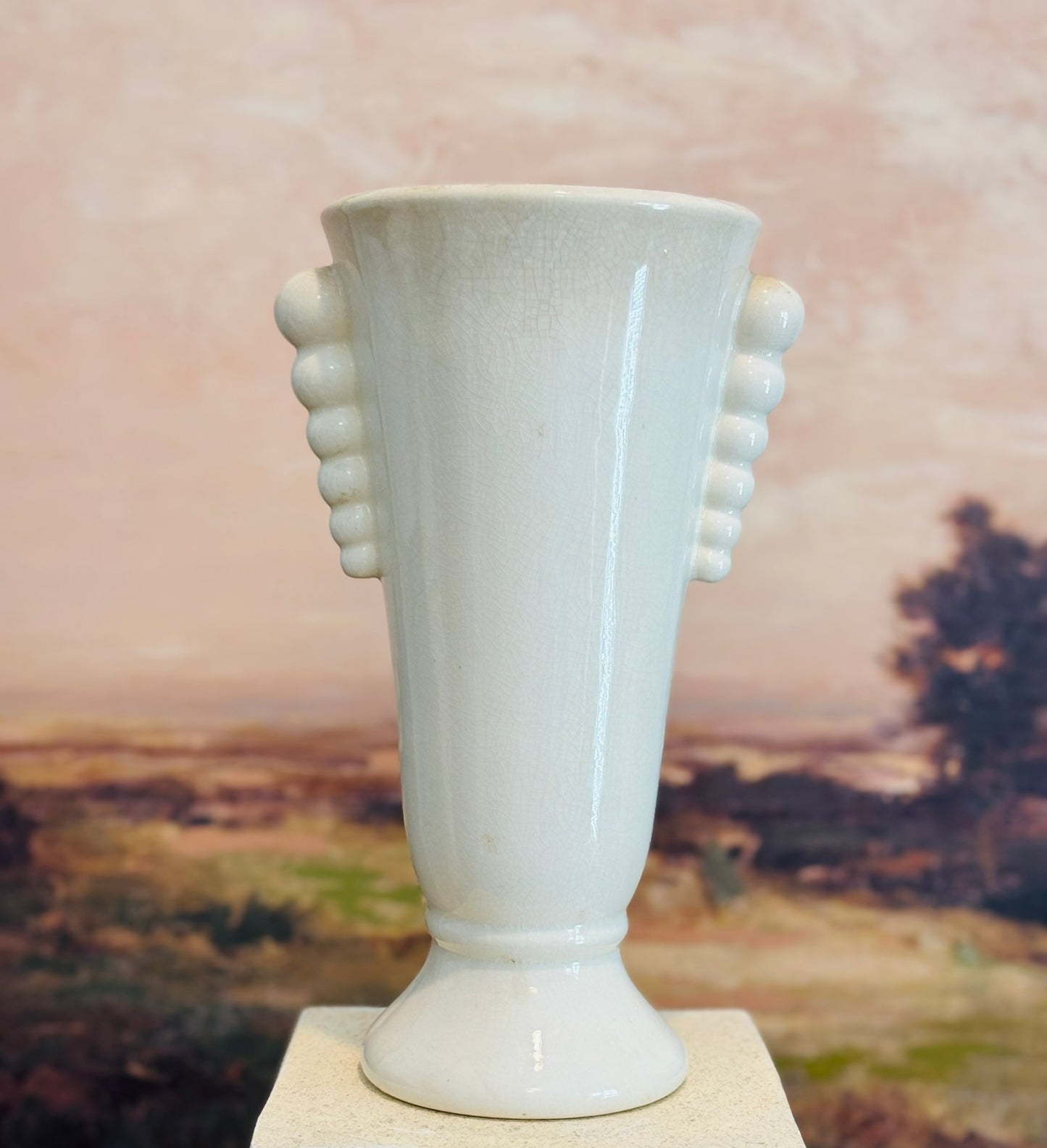 Cream stoneware vase with bubble handles 10.25 h 6.5 w 5 d