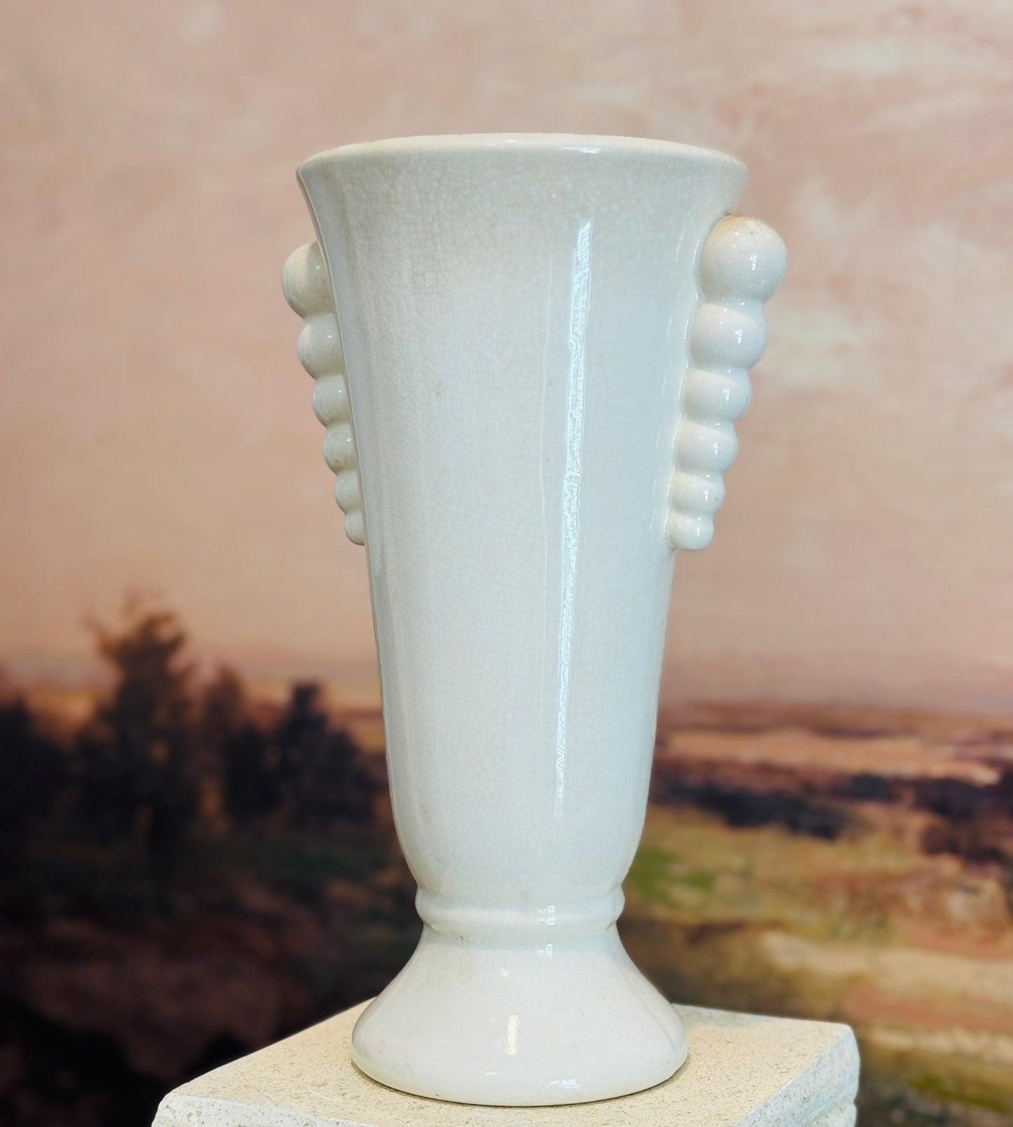 Cream stoneware vase with bubble handles 10.25 h 6.5 w 5 d