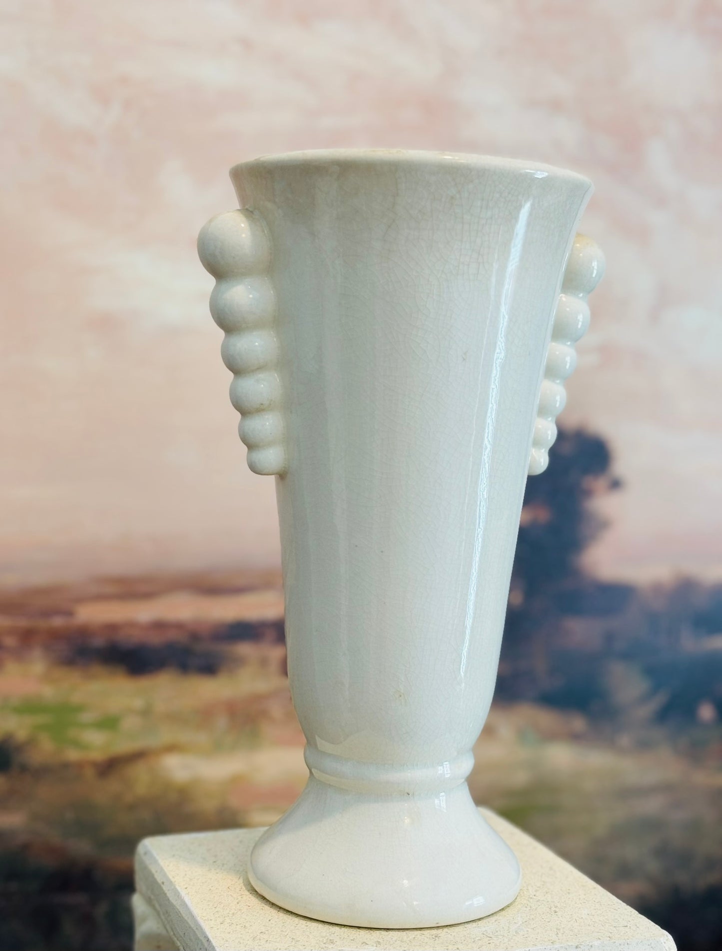 Cream stoneware vase with bubble handles 10.25 h 6.5 w 5 d