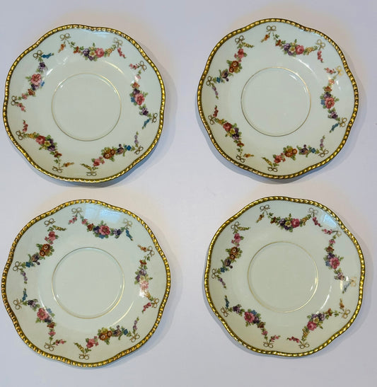 Set of 7 6.5 w Bavaria Dresdner Art plates w/gold rims and gold bows