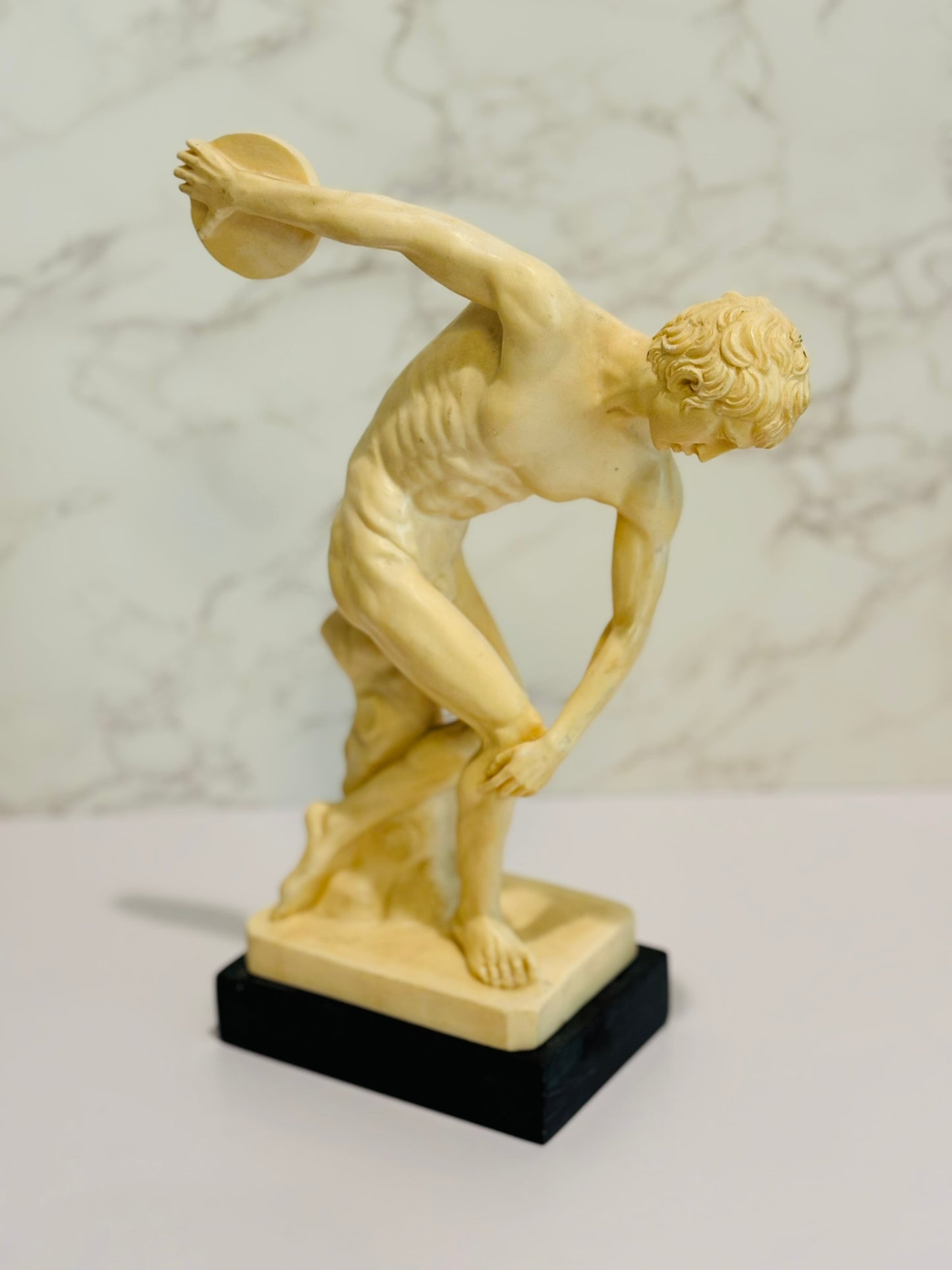 A. Santini Disc Thrower statue 12 h x 5 l x 3.5 w
