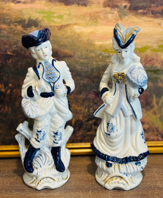 Victorian Blue and white figurines 12 h 4.75 w 4.25 d each