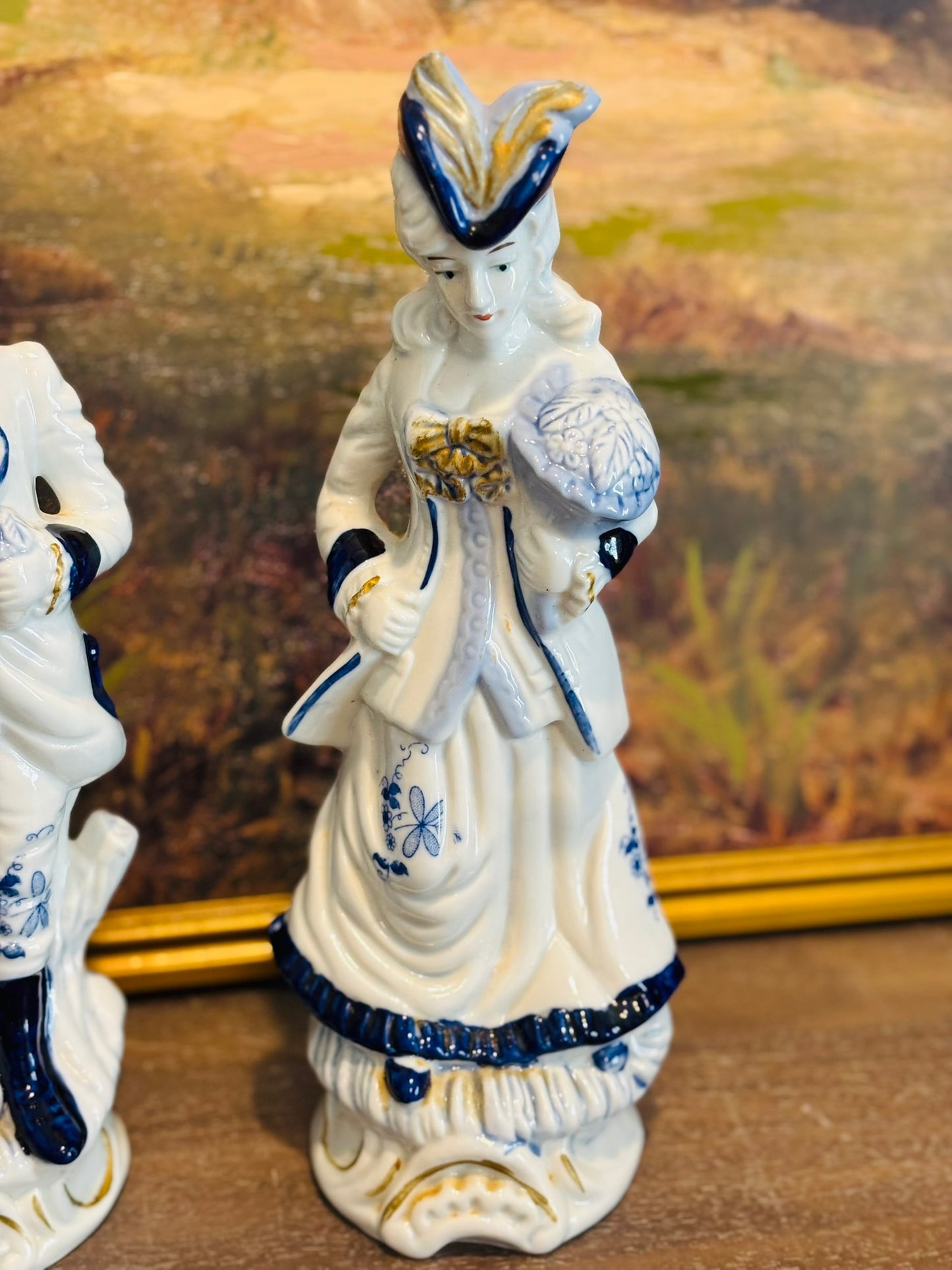 Victorian Blue and white figurines 12 h 4.75 w 4.25 d each