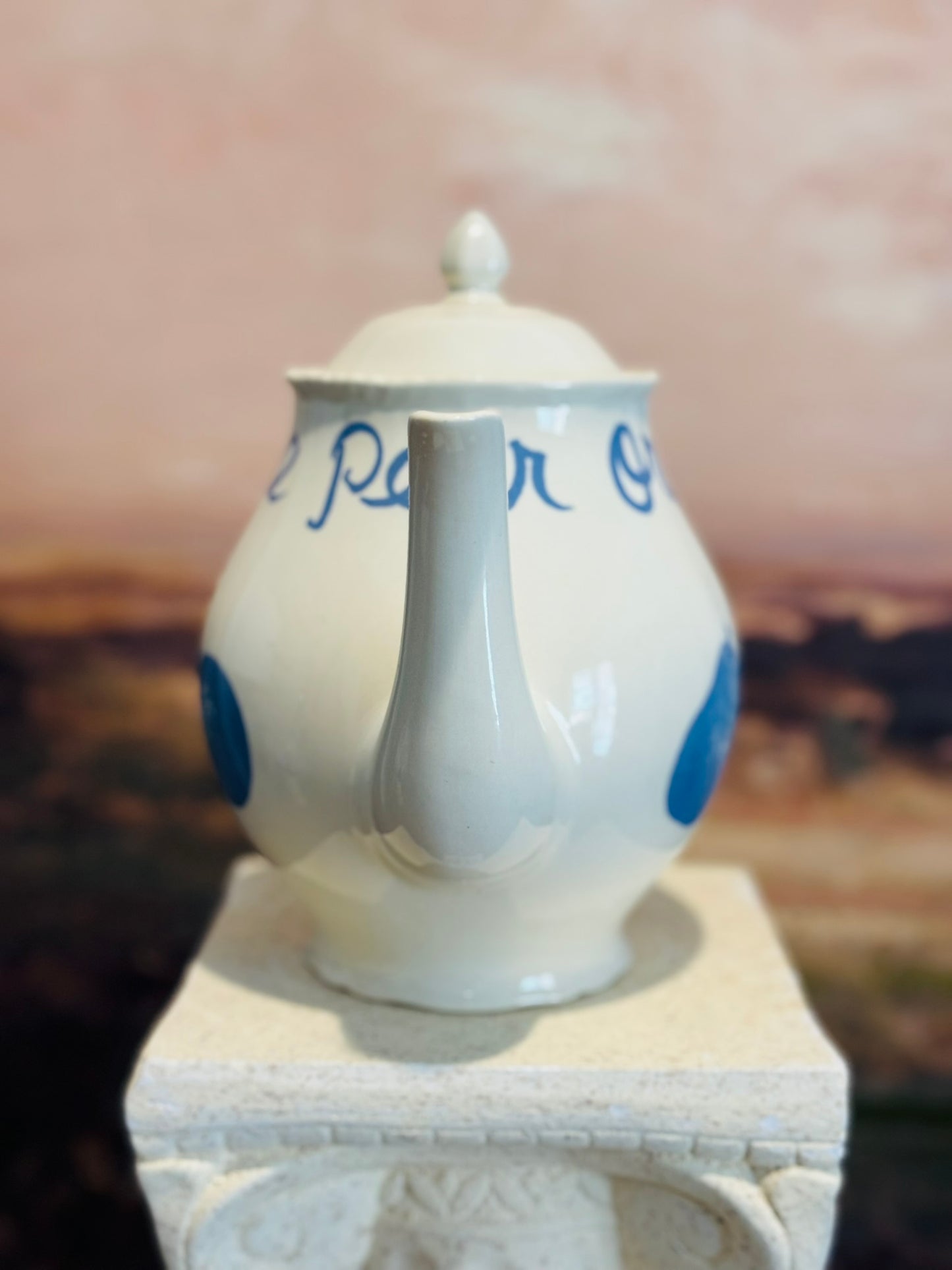 White and blue teapot  with fruit 10 d 7.5 h 5.5 w