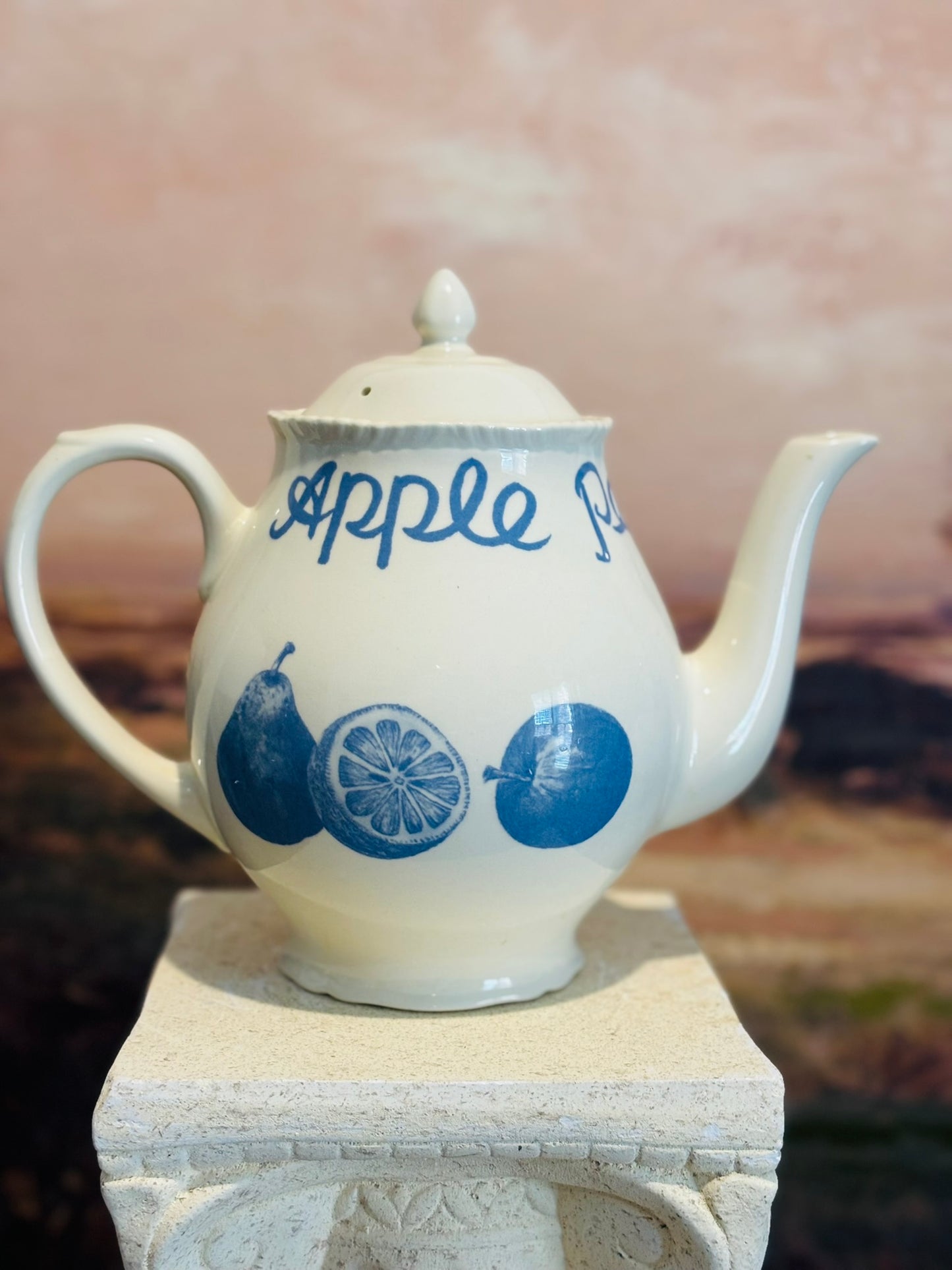 White and blue teapot  with fruit 10 d 7.5 h 5.5 w