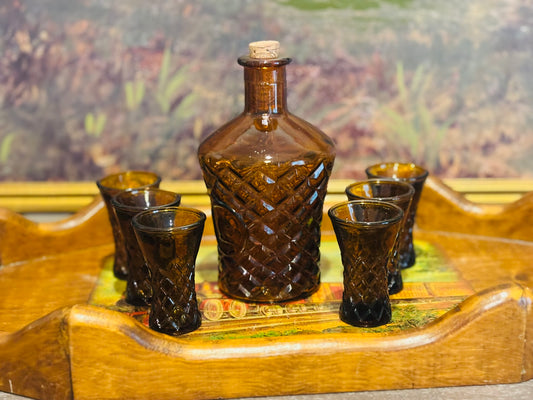 Amber decanter with 5 glasses decanter 7.5 h x 4 w glasses  3 h x 1.75 w each