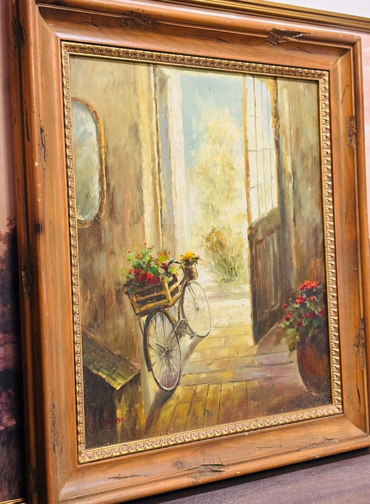Oil painting on canvas, scene with bike and flowers, signed L E Russo 31 x 26