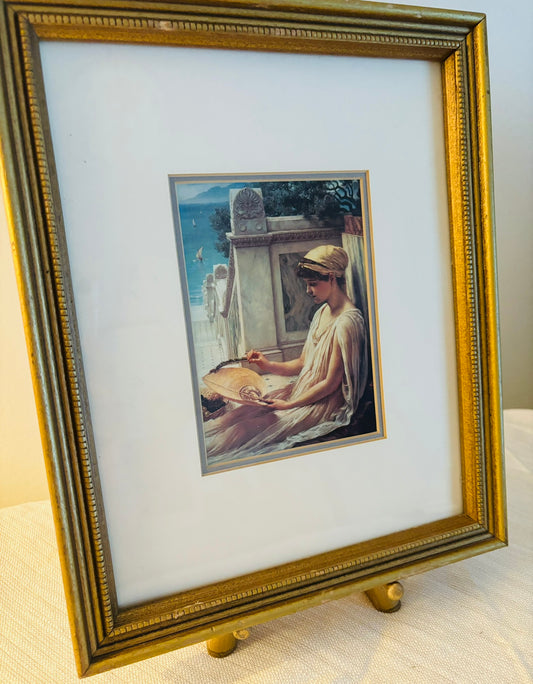 Print with woman in all cream (hat and gown) sitting with a fan 9 x 11