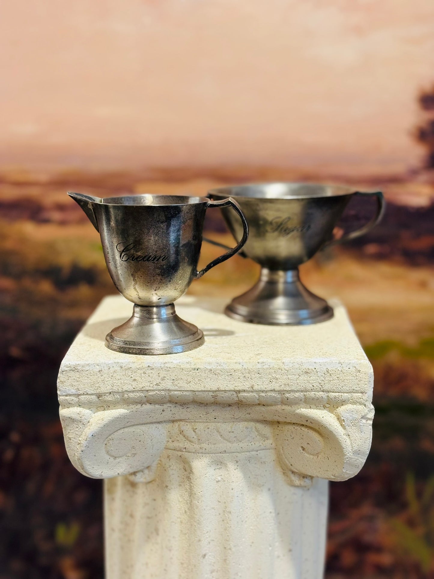 Pewter sugar and cream set 11 oz tog 3 h 4.75 w 3.5 d sugar, 3.25 h 4 w 2.25 d cream