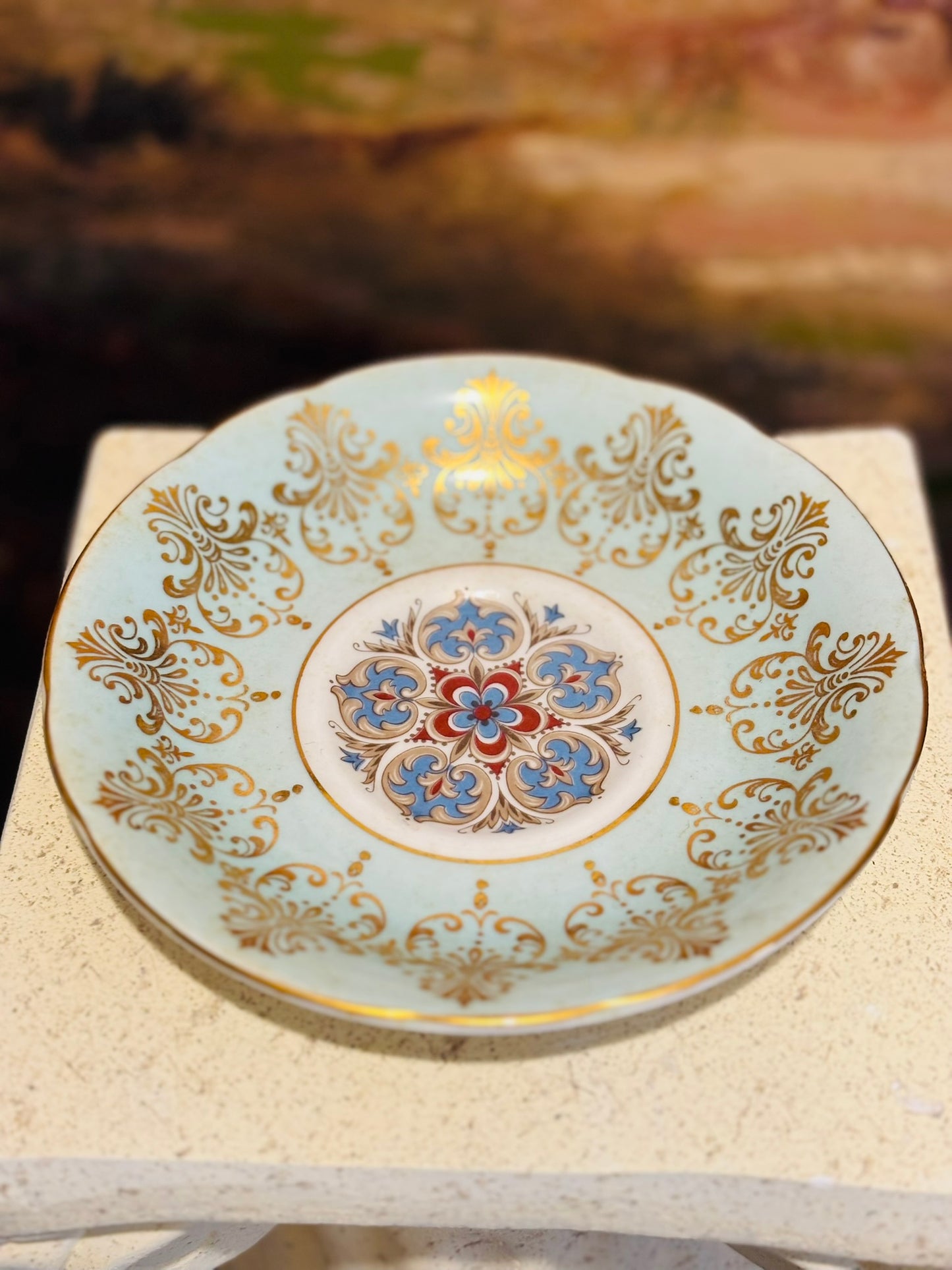 Paragon Beautiful Blue Teacup and Saucer w/gold mandala medallion