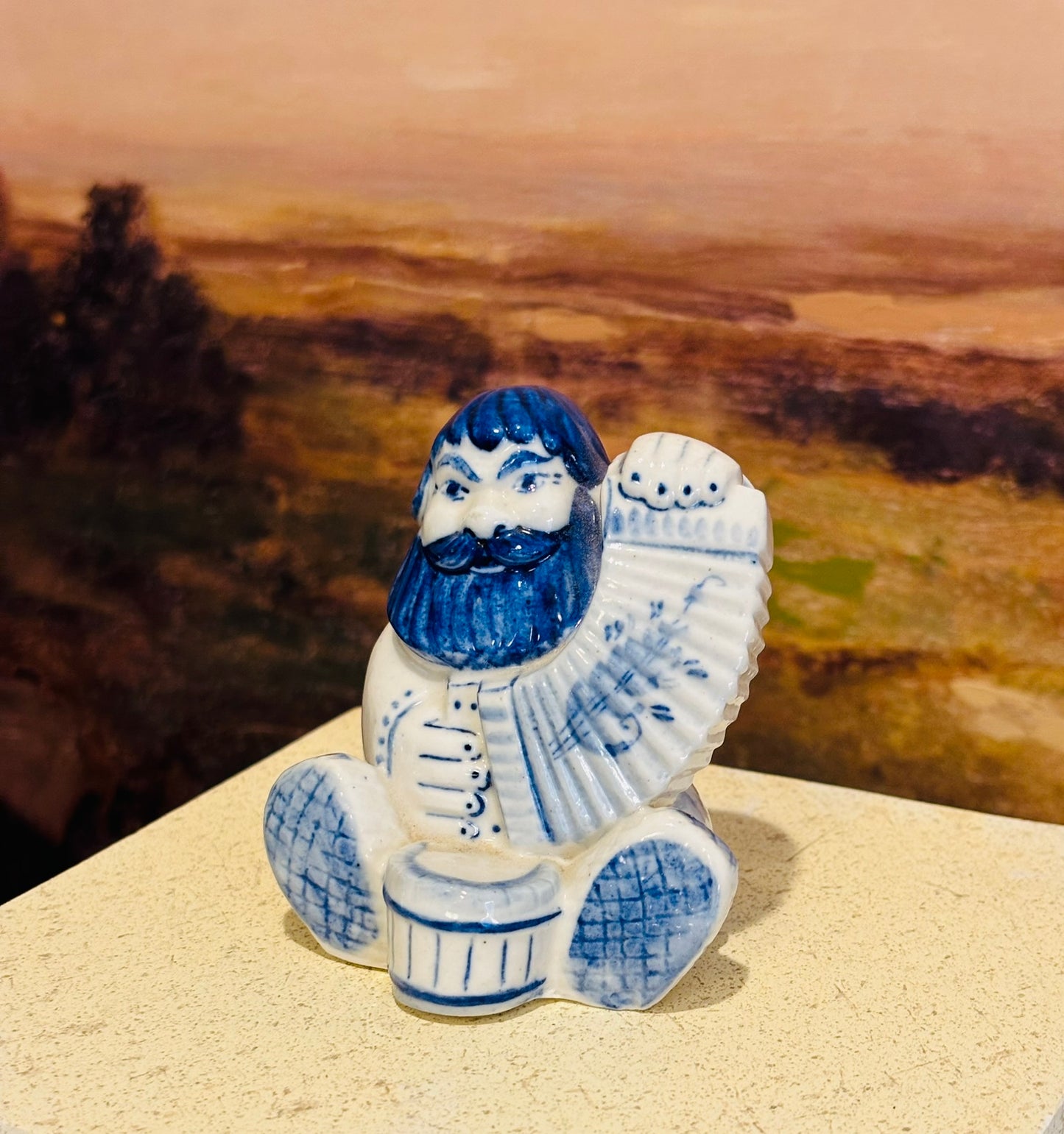 Gzhel hand painted russian man blue and white figurine accordion