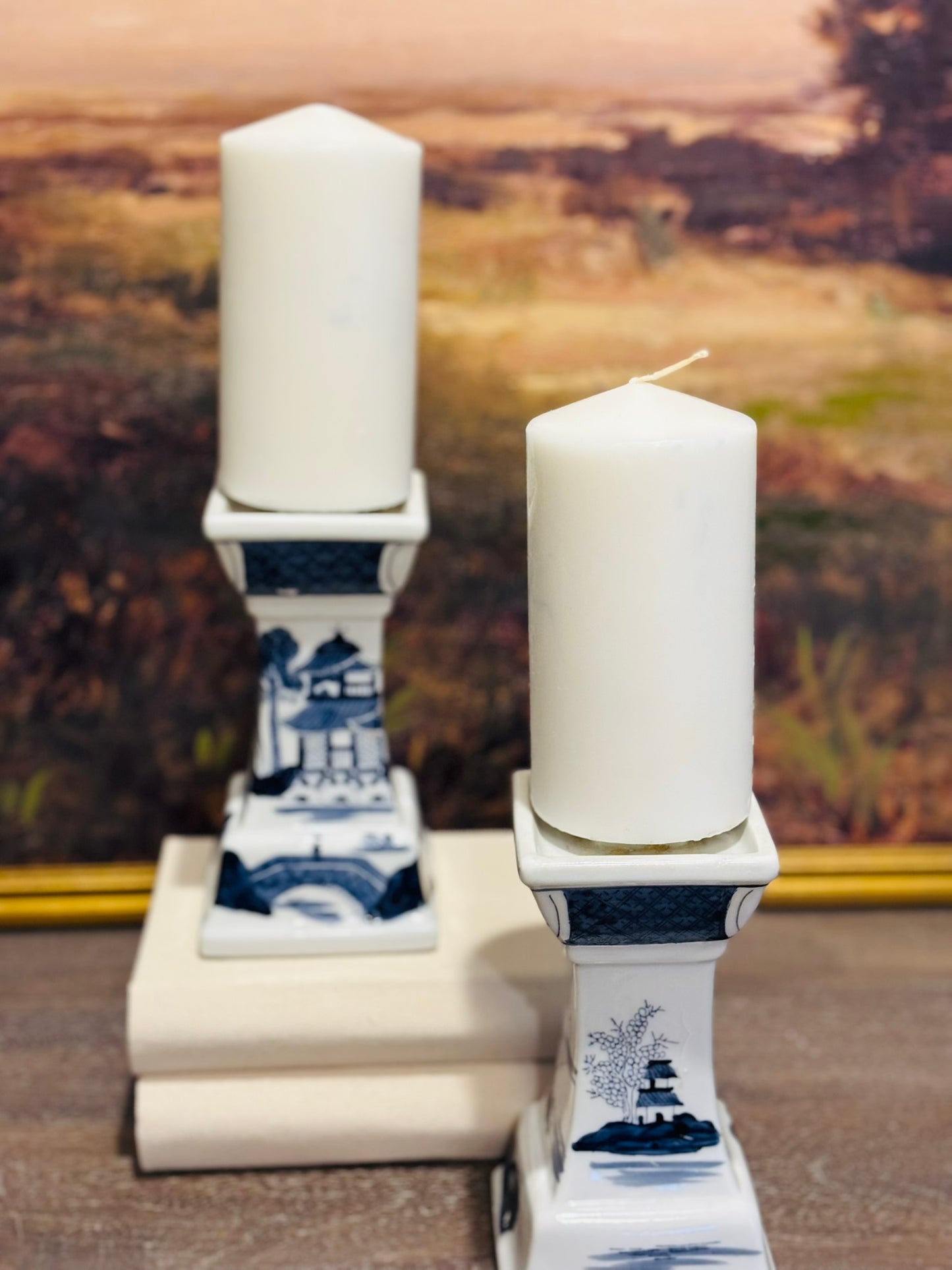 Pair of Navy blue and white Asian Candlesticks stamped 7 h 3.5 w
