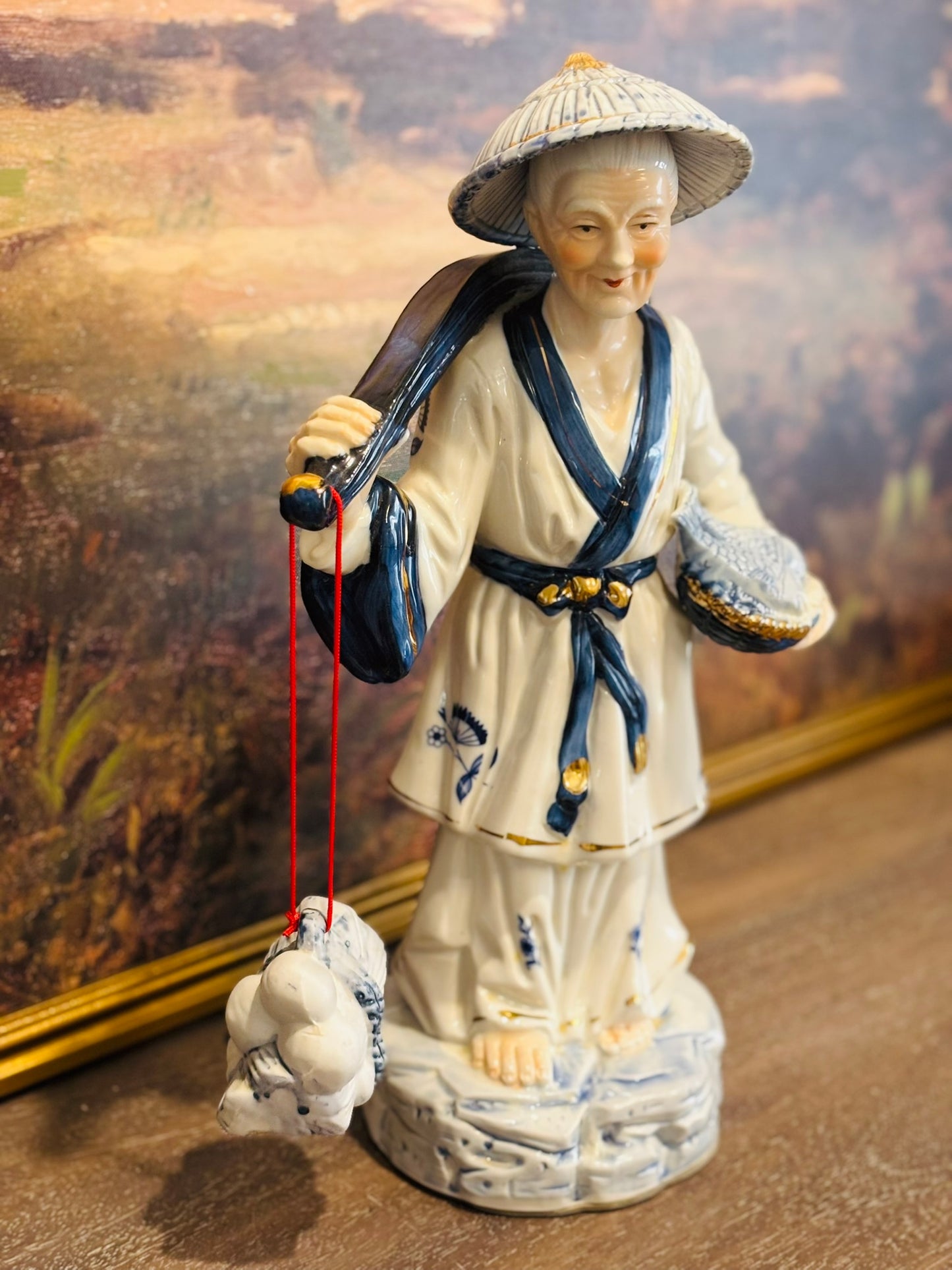 Tall Blue and White Asian Fisherman  15 h 8.5 w 7 d