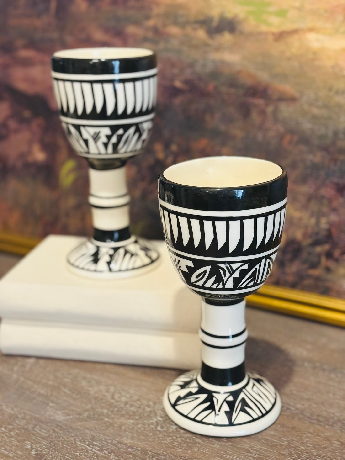 Pair of tall black and white goblets 8.5 h x 4.5 w