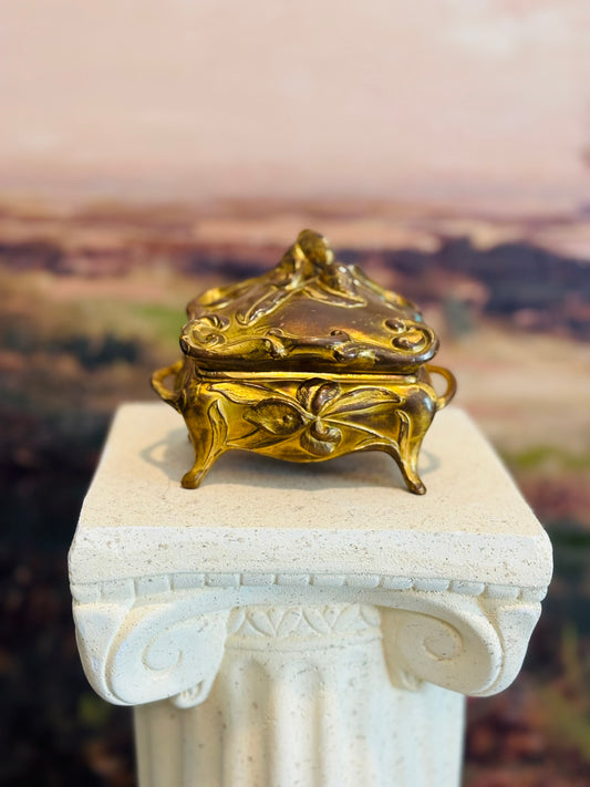 B& W Gold Plated Casket with Flowers and leaves on top 5 l 3.5 h 2.5 w