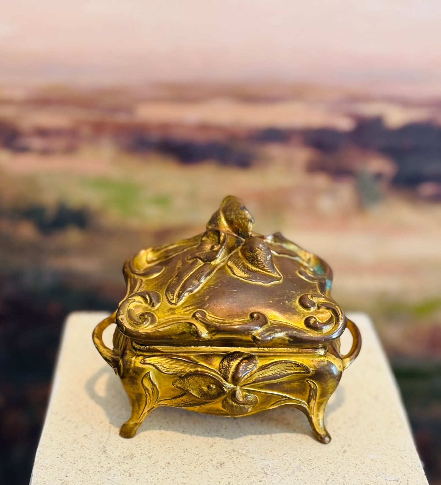 B& W Gold Plated Casket with Flowers and leaves on top 5 l 3.5 h 2.5 w