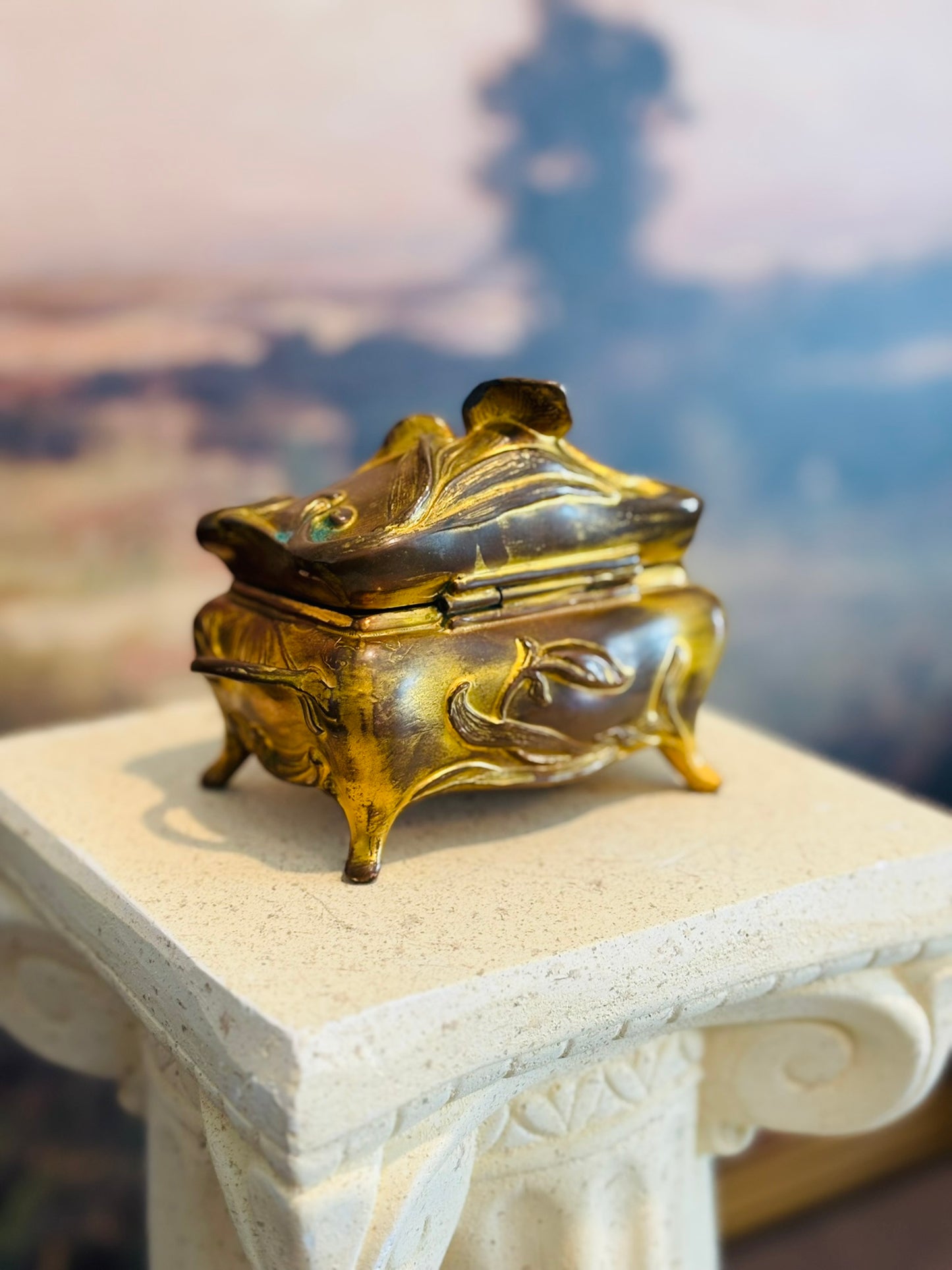 B& W Gold Plated Casket with Flowers and leaves on top 5 l 3.5 h 2.5 w