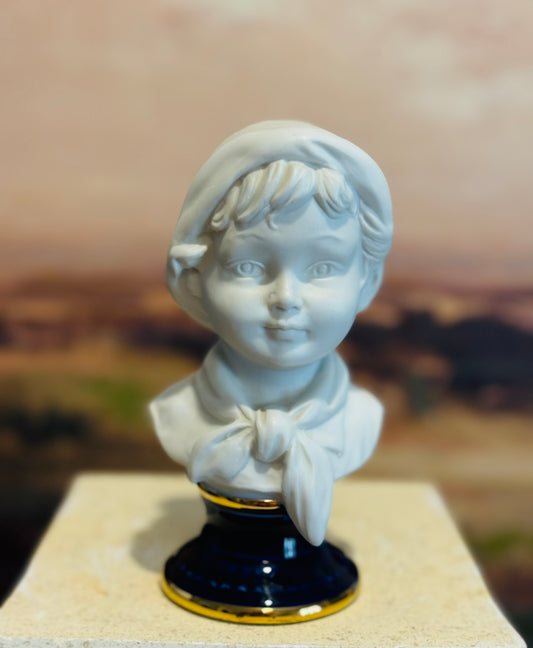 Bust on cobalt base marked 6 h 2.5 d 3.25 w