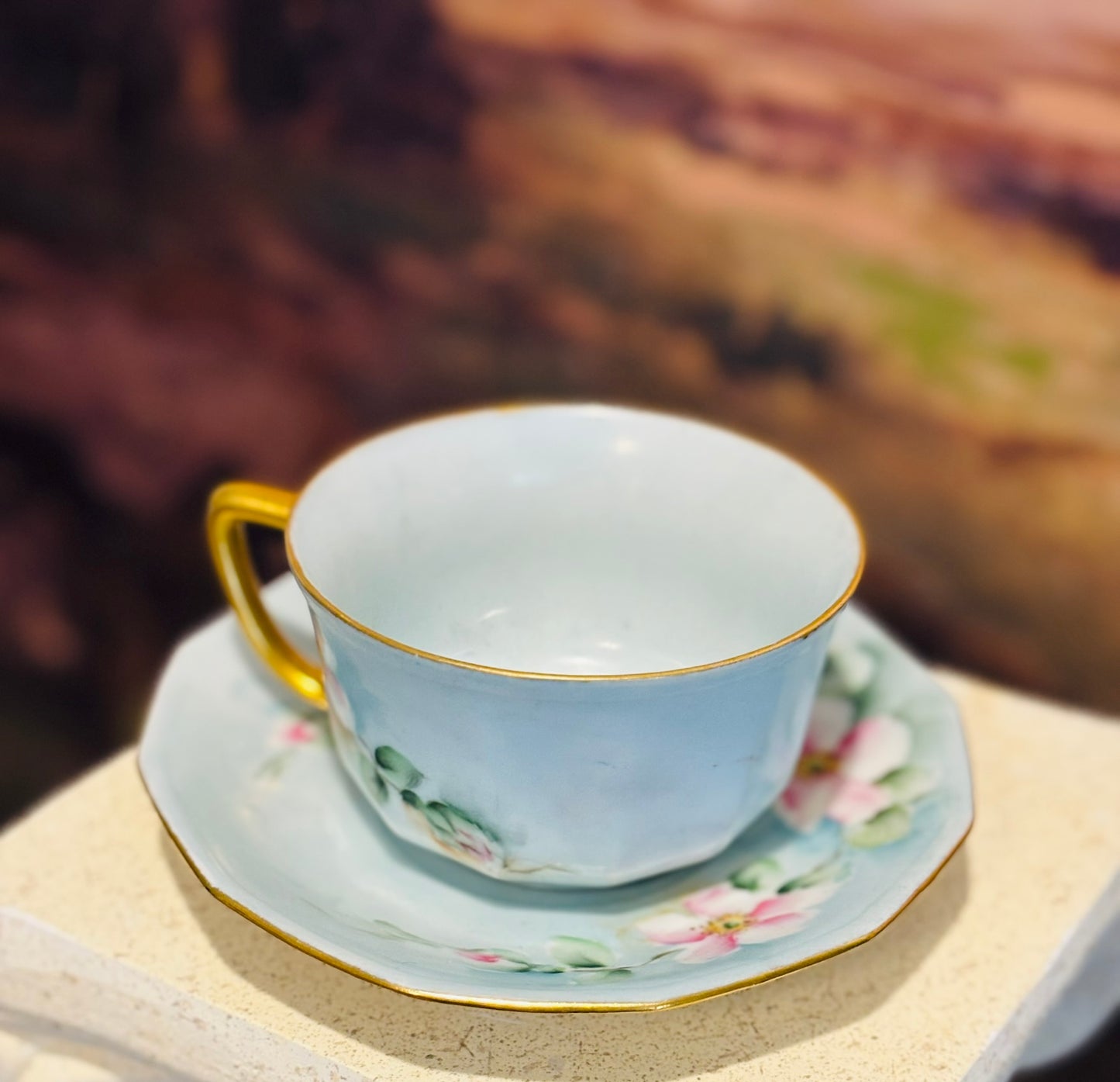 Pair of  Weimar Pink and green floral teacups and saucers