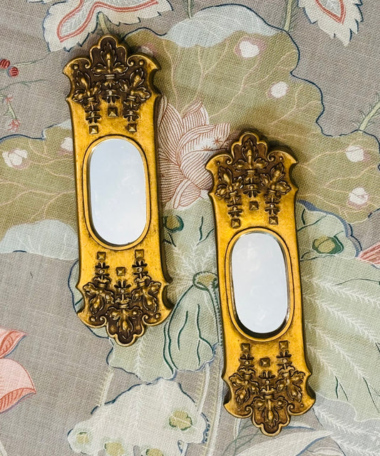 Pair of gold Gargoyles Statios of NY 8.75 l 2.25 w 1 h